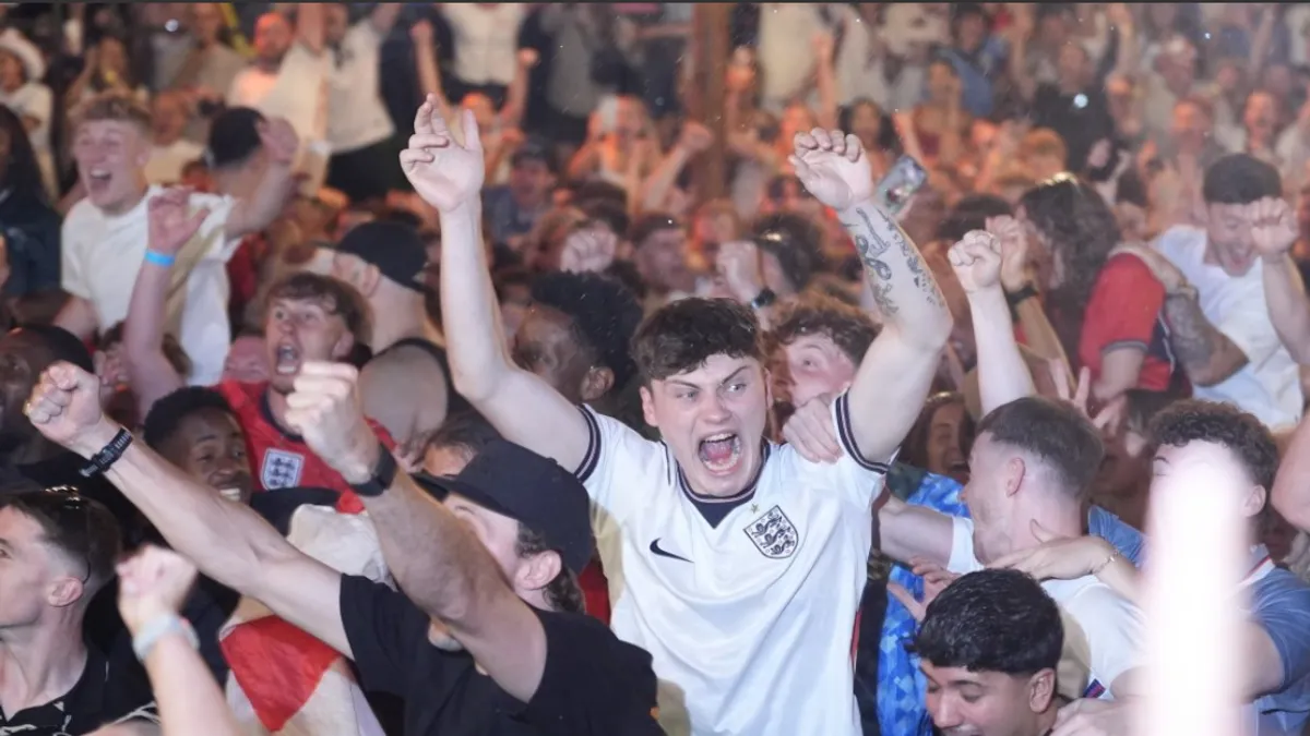 England Fans Celebrate Dramatic Extra-Time Victory in Manchester