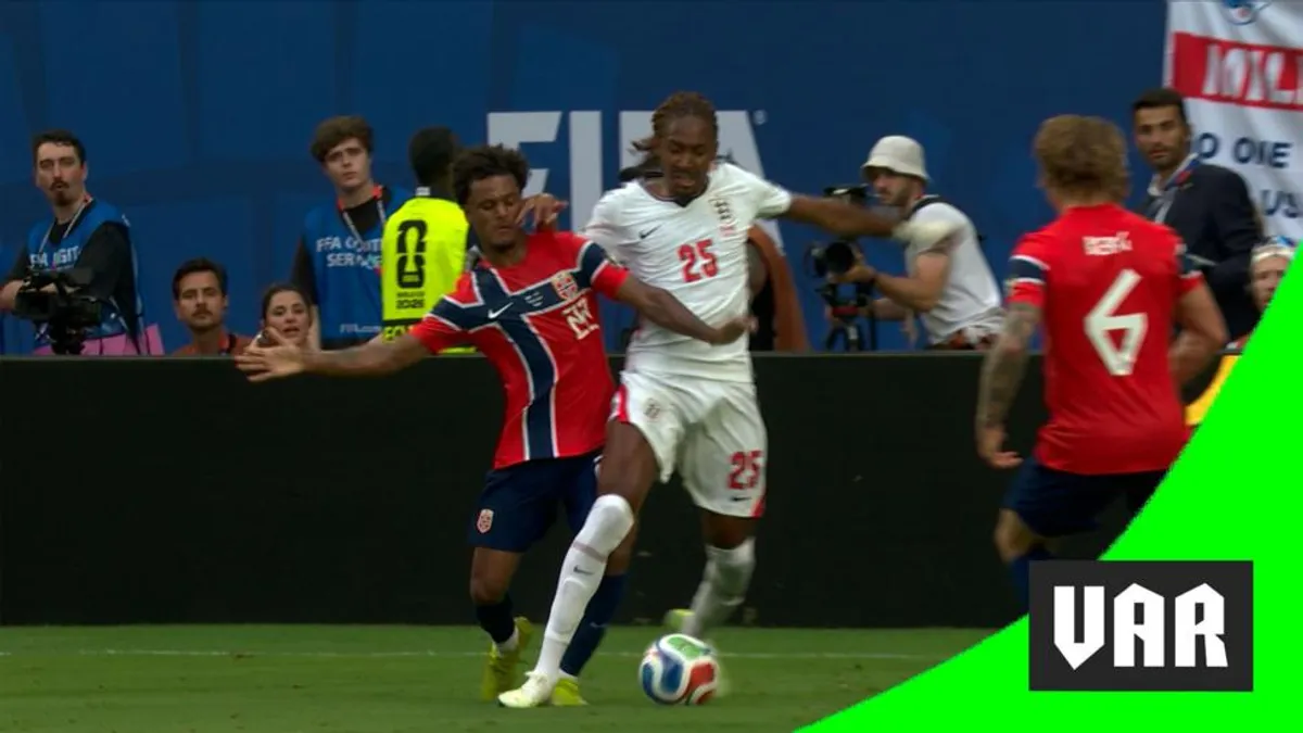 VAR Decision Sparks Debate as England's Penalty is Revoked